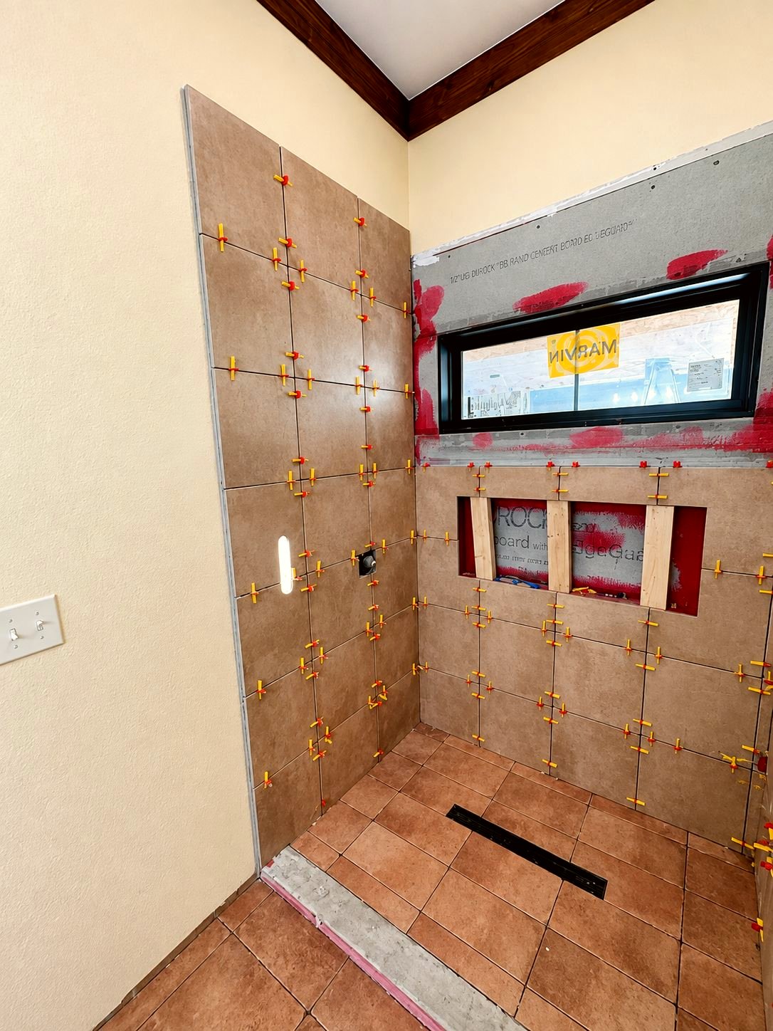Tile installation in progress