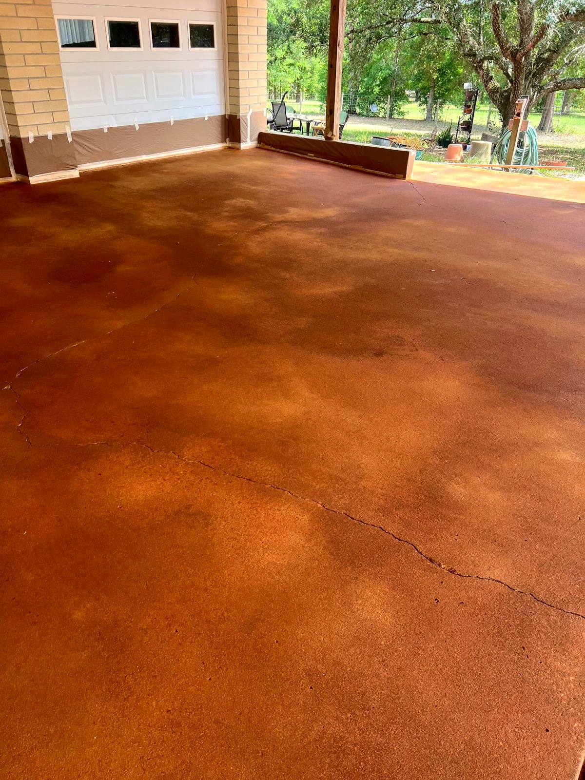 Stained concrete finished under carport