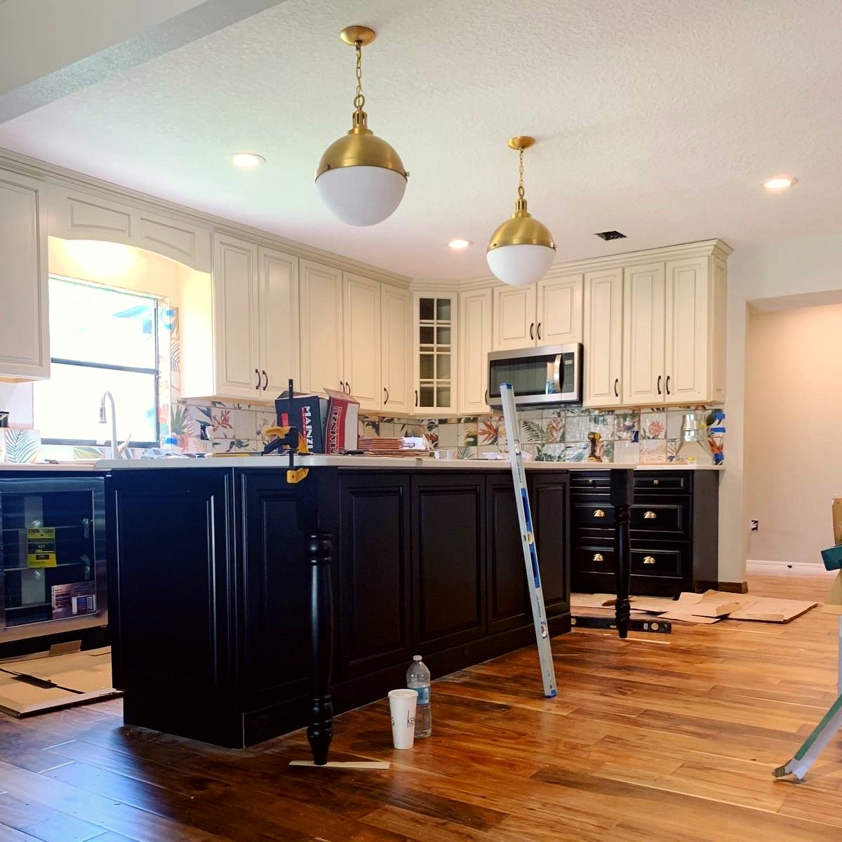 New kitchen cabinets and island being installed